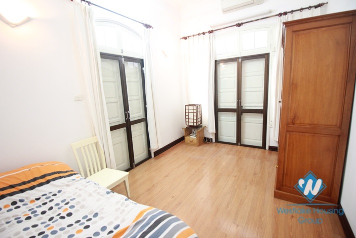Lakeside house with small yard and nice terrace for rent in Tay Ho